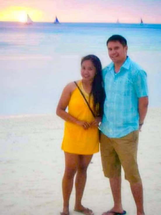 The couple on the beach at sunset