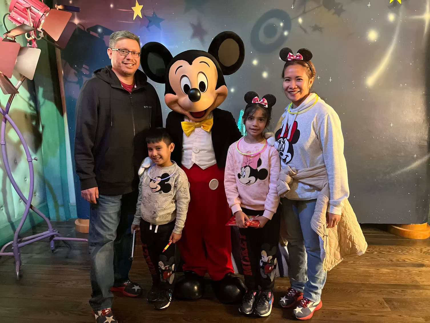 A family meeting Mickey Mouse at Disneyland